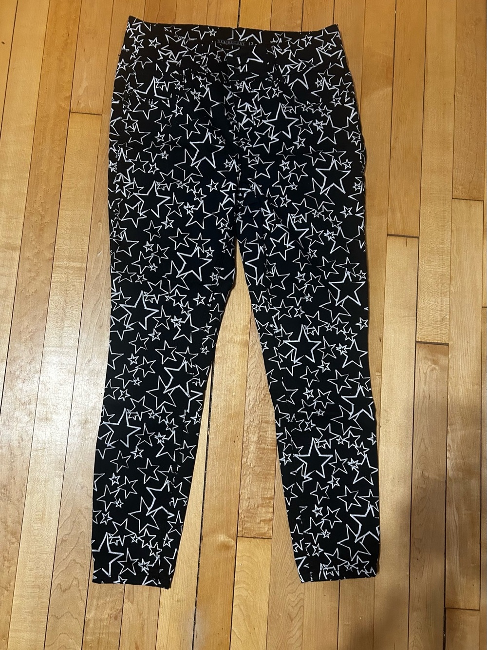 Blackheart Black Skinny Jeans with White Star Print from Hot Topic